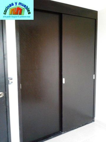 closets economico en melamina llama al 42119803
www.cocinasymuebles.com