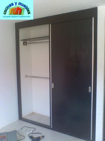 closets economico en melamina llama al 42119803
www.cocinasymuebles.com