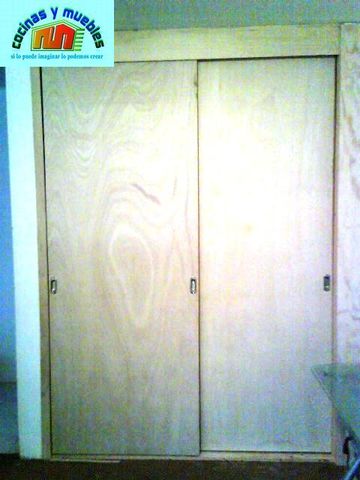 closets economico en melamina llama al 42119803
www.cocinasymuebles.com