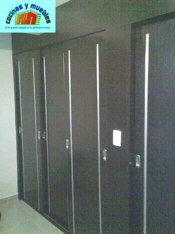 closets economico en melamina llama al 42119803
www.cocinasymuebles.com