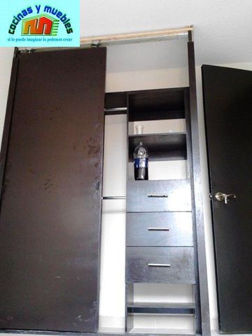 closets economico en melamina llama al 42119803
www.cocinasymuebles.com