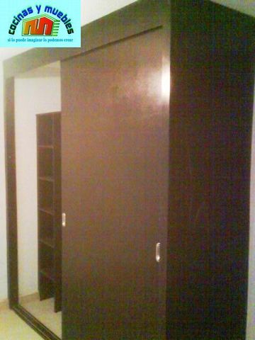 closets economico en melamina llama al 42119803
www.cocinasymuebles.com