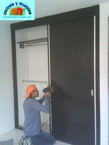 closets economico en melamina llama al 42119803
www.cocinasymuebles.com