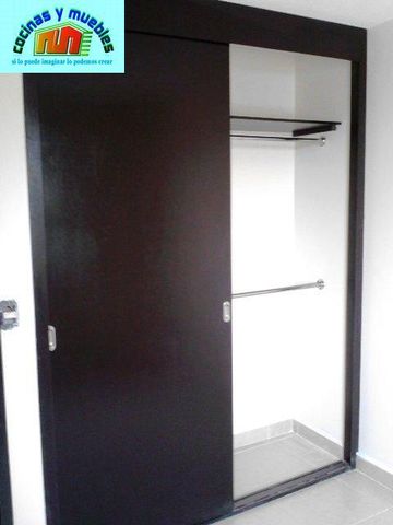 closets economico en melamina llama al 42119803
www.cocinasymuebles.com