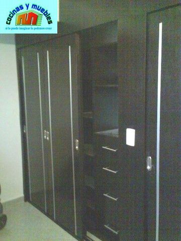 closets economico en melamina llama al 42119803
www.cocinasymuebles.com