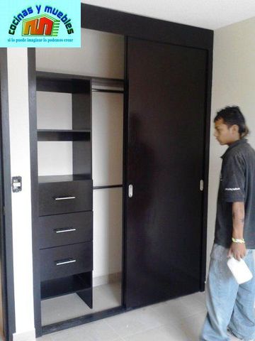 closets economico en melamina llama al 42119803
www.cocinasymuebles.com