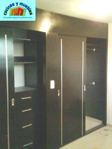 closets economico en melamina llama al 42119803
www.cocinasymuebles.com